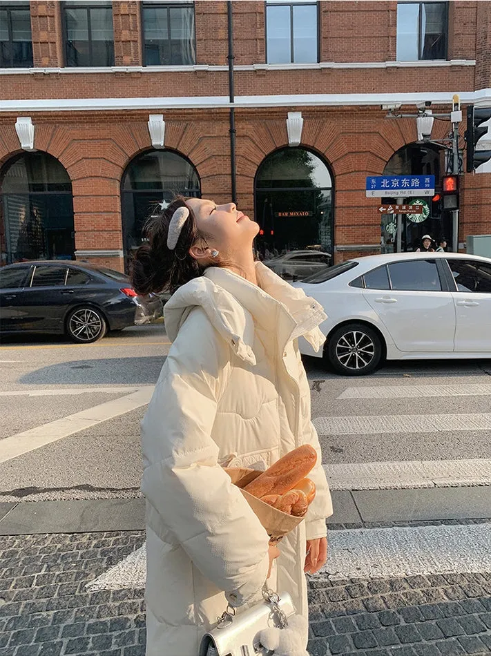 Cozy Knee-Length Oversized Puffer Coat with Flap Pockets