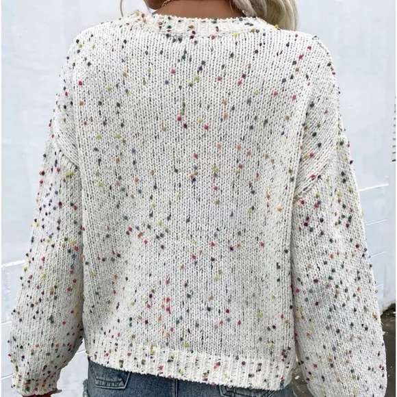 New popcorn knit long sleeve sweater