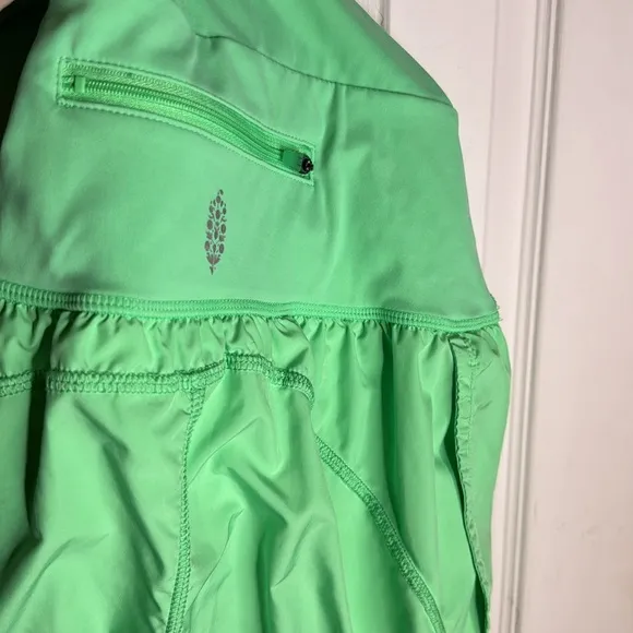 Vibrant Green One Piece with Cutout and Shorts Style